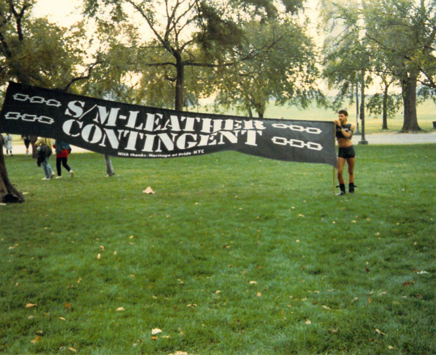 Download the full-sized PDF of March on Washington S/M Leather Contingent in Grass (October 11, 1987)