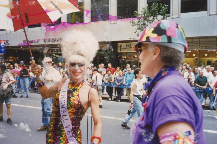 Download the full-sized image of A Photograph of Stormé DeLarverie in a Multicolored Hard Hat and Purple Shirt